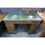 A mahogany pedestal desk