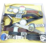 A collection of wristwatches in a display case