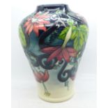 A Moorcroft Scarlet Star limited edition vase, designed by Anj Davenport, dated 2001, numbered 26/