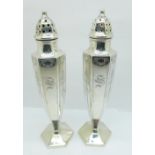 A pair of sterling silver pepperettes, 106g