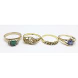 A yellow metal and green stone ring, 3.2g, P, a silver gilt ring, and two other rings