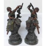 A pair of spelter figures on marble bases, cherries and raisins, after Francois Moreau