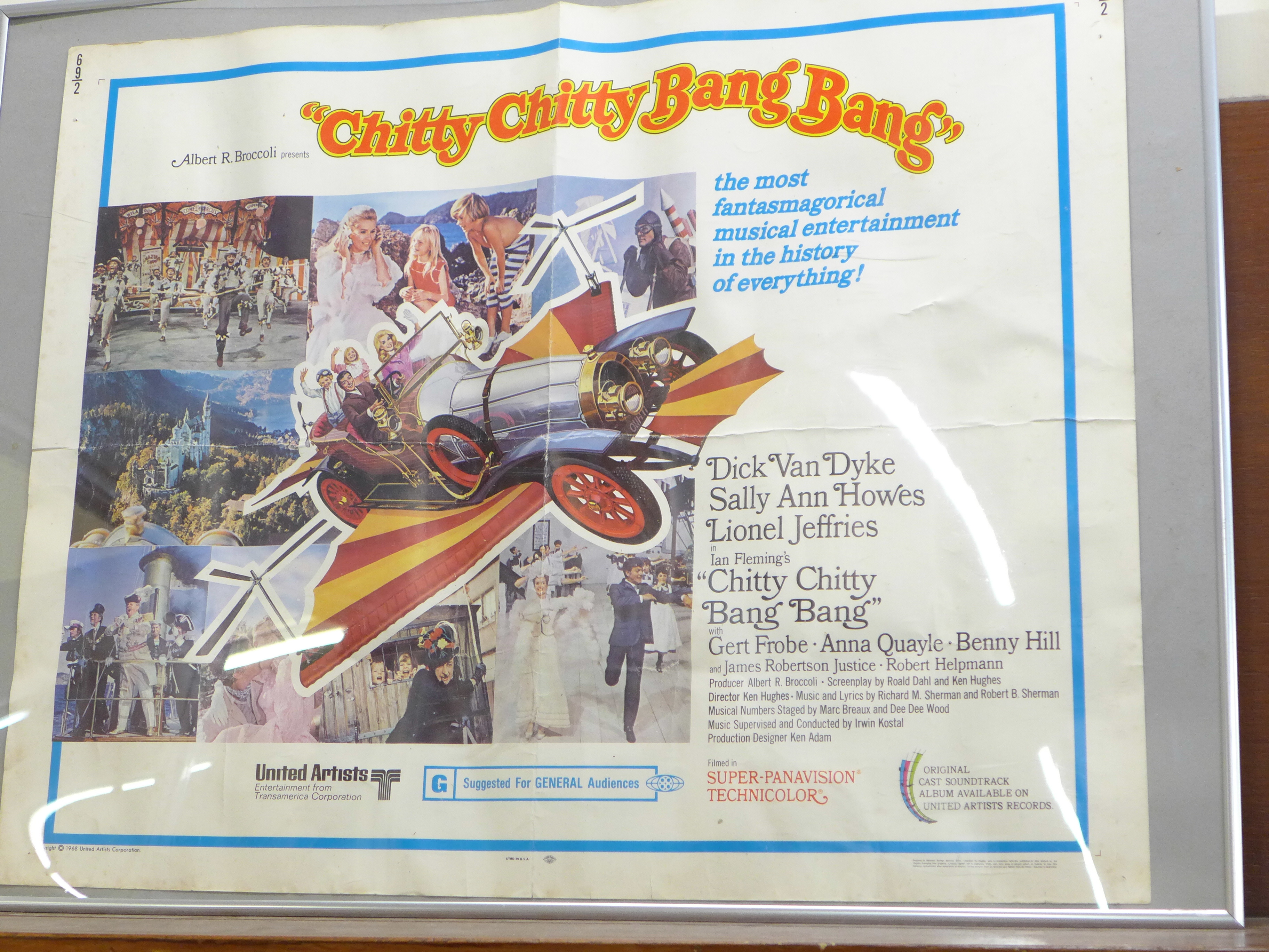 A Chitty Chitty Bang Bang poster, an Aurora model kit, a Corgi Toys model, a/f, and one other - Image 6 of 6