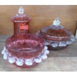 Three items of cranberry glass, one lid a/f