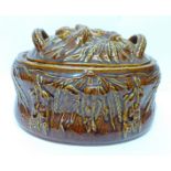 A Portmeirion Pottery No. 1 size treacle glaze game pie covered dish