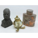 A Chinese embossed copper plated tea caddy, a bronze bust of a Native American and a brass and glass