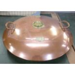 A Jones Bros brass and copper spherical warming pan