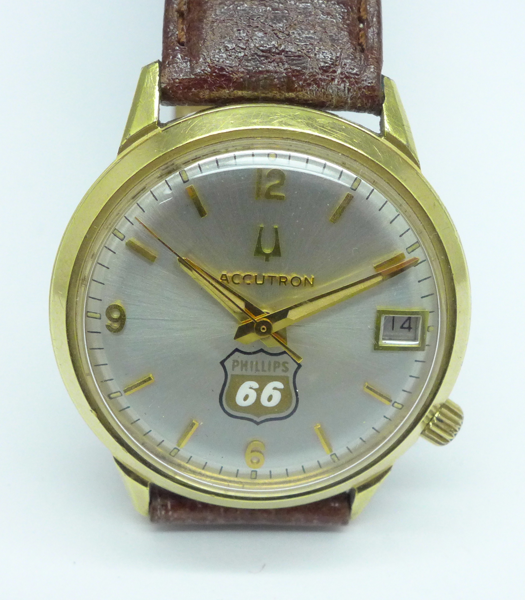 A gentleman's Bulova Accutron gold plated wristwatch with inscription dated 1977, 'Phillips