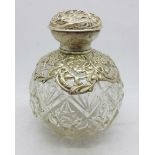 A silver topped globular glass scent bottle, top a/f