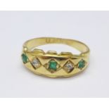 An 18ct gold, emerald and old cut diamond ring, 2.9g, I, one emerald a/f