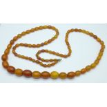 A string of amber beads, 54g