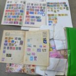 A folder of stamps; four albums and loose