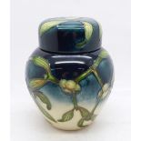 A Moorcroft Mistletoe ginger jar, designed by Anji Davenport, (only available December 2001) 11.5cm,