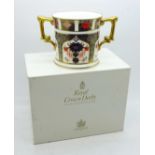 A Royal Crown Derby Old Imari 1128 pattern loving mug, boxed