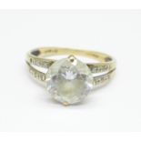 A 9ct gold and cubic zirconia ring, 2.1g, K, lacking one small stone on the shoulder