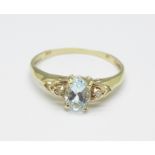 A 9ct gold, blue stone and diamond ring, 1.1g, O