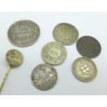 Coins including an 1836 one shilling, 1843 half farthing, 1888 six pence and a pin set with an