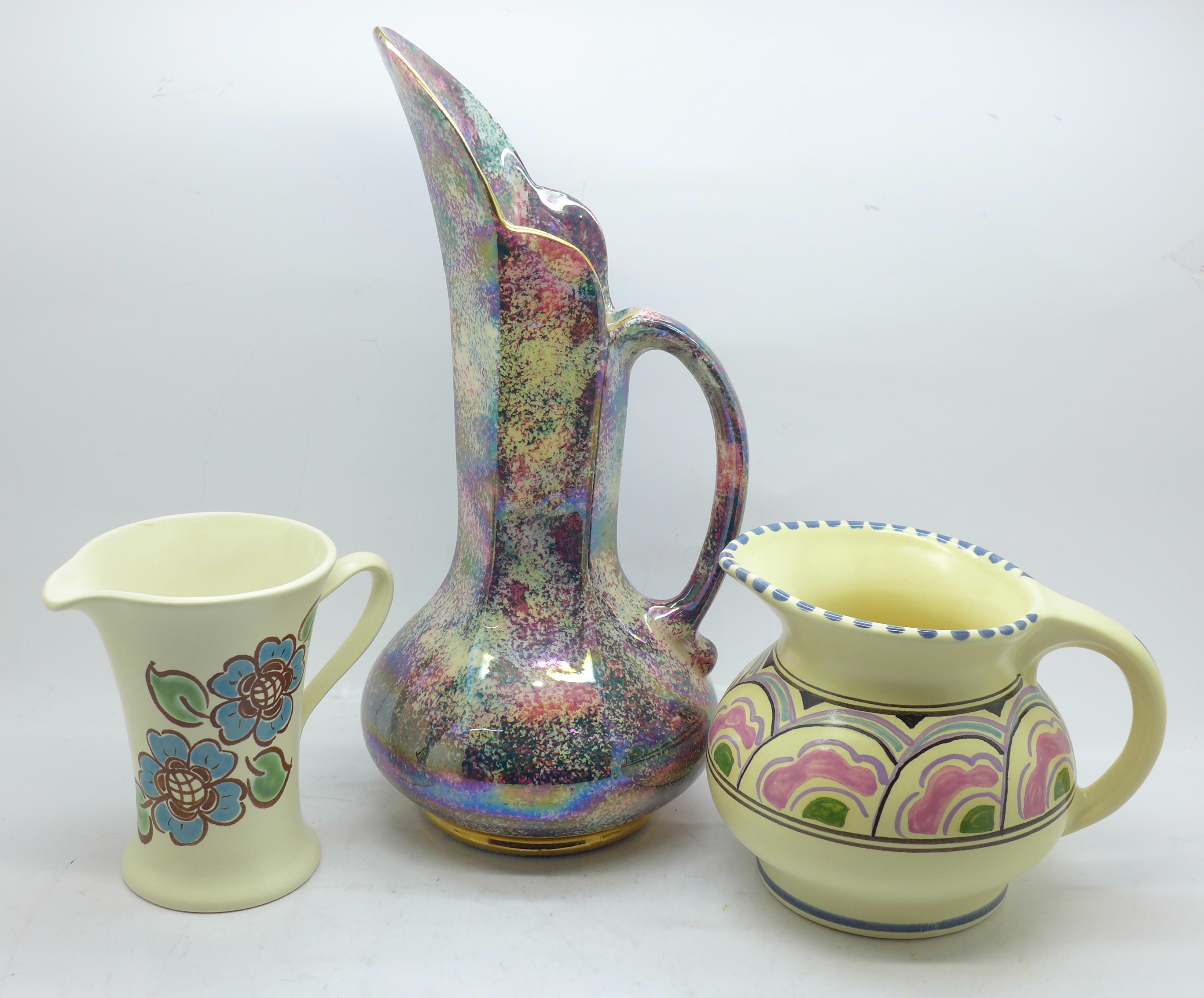 Two Honiton pottery jugs and a Govancroft of Glasgow lustre jug