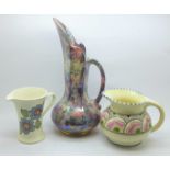 Two Honiton pottery jugs and a Govancroft of Glasgow lustre jug
