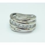 A platinum, seven stone princess cut diamond ring, approximately 1.25carat diamond weight, 12.4g, M