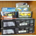 Four model vehicles including Corgi Goldfinger 007 Rolls Royce and two Corgi A Century of War