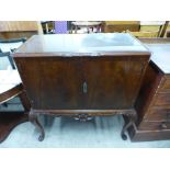 A Queen Anne style mahogany cocktail cabinet