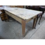 A pine single drawer kitchen table