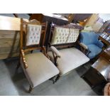 A Victorian mahogany and upholstered salon settee and armchair