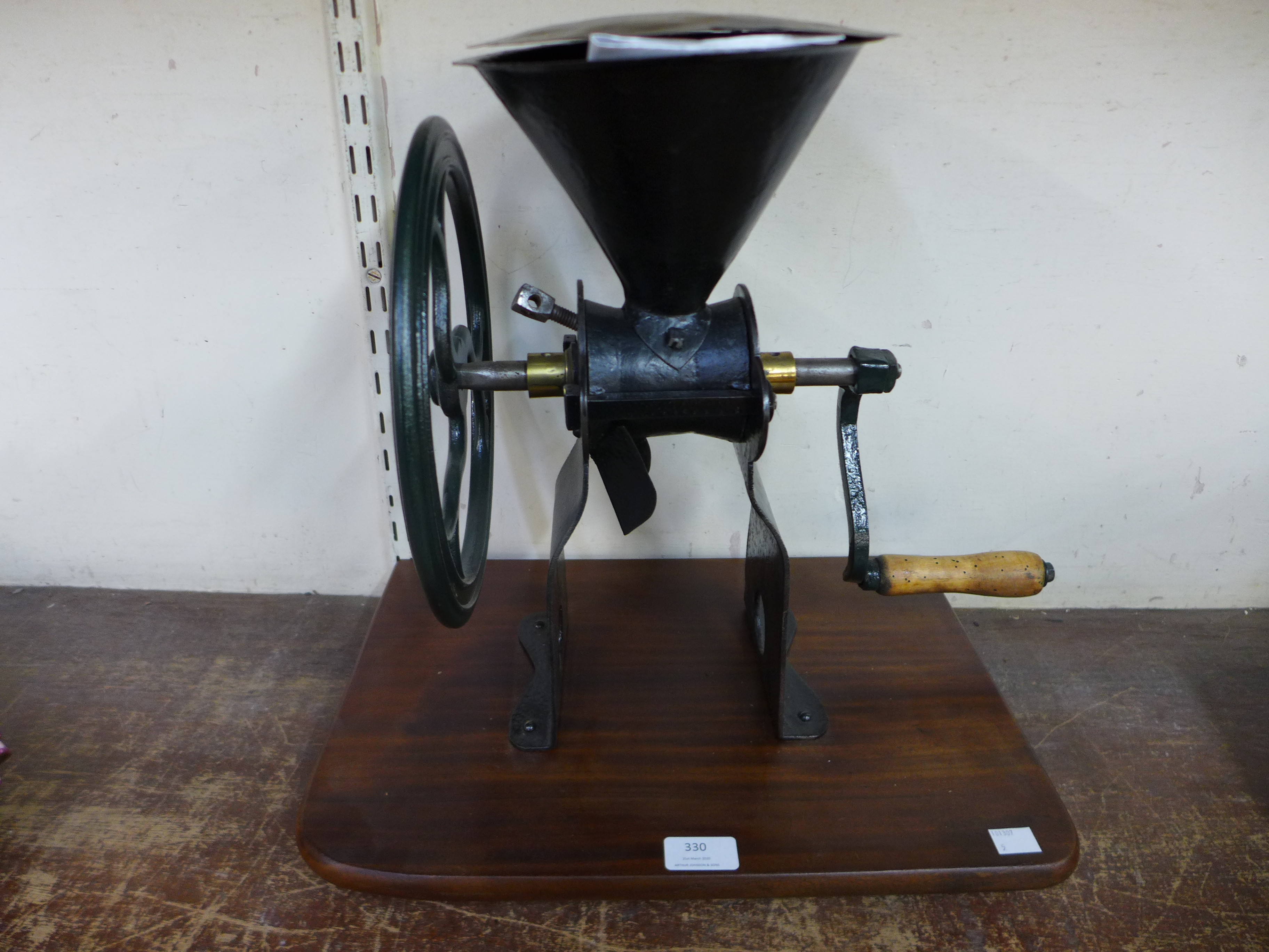 A cast iron grinder by Zachariah Parkes