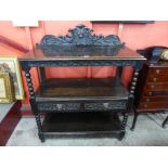 A Victorian Jacobean Revival carved oak buffet