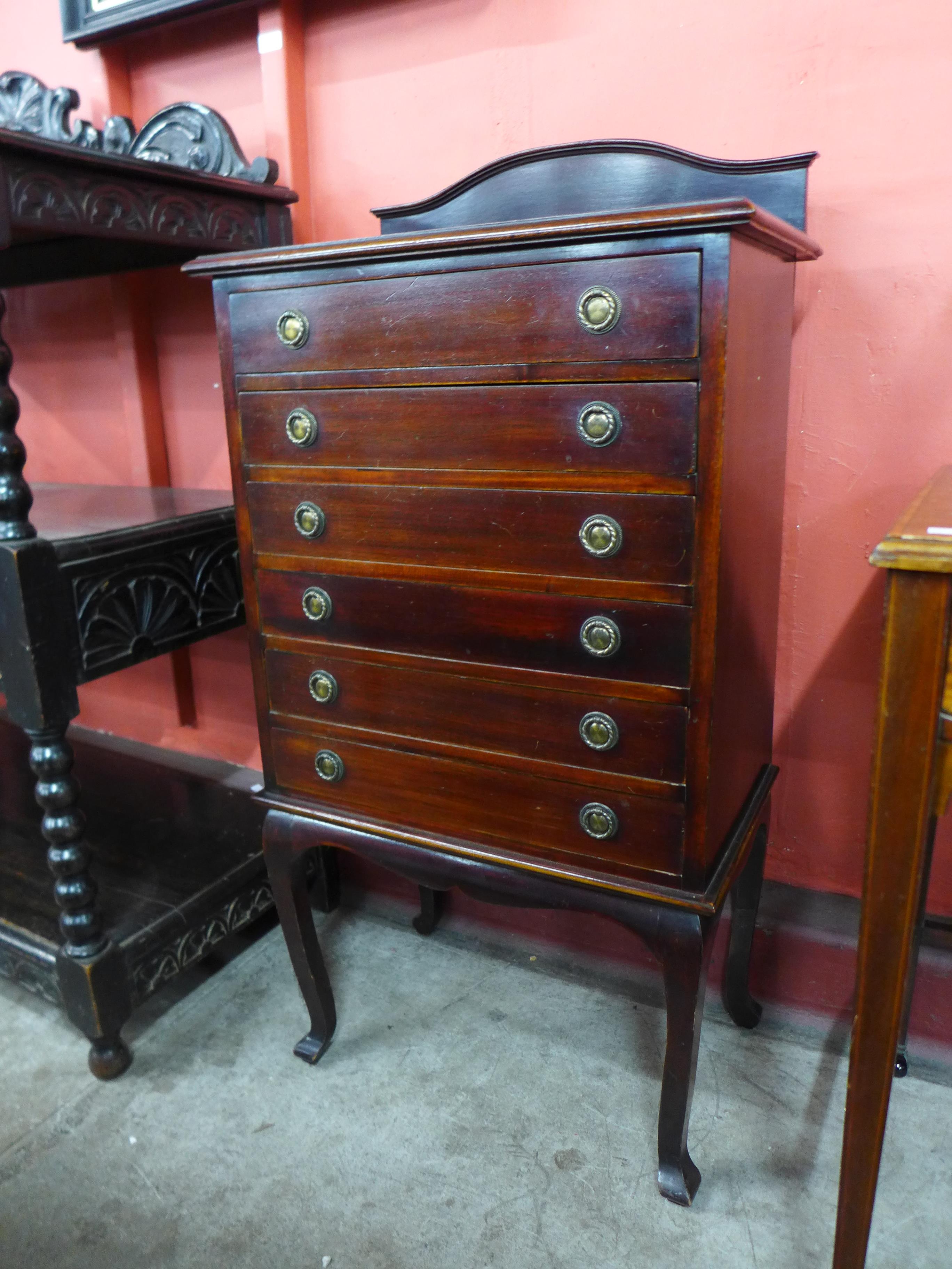 An Edward VII mahogany music cabinet