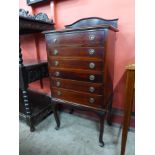 An Edward VII mahogany music cabinet