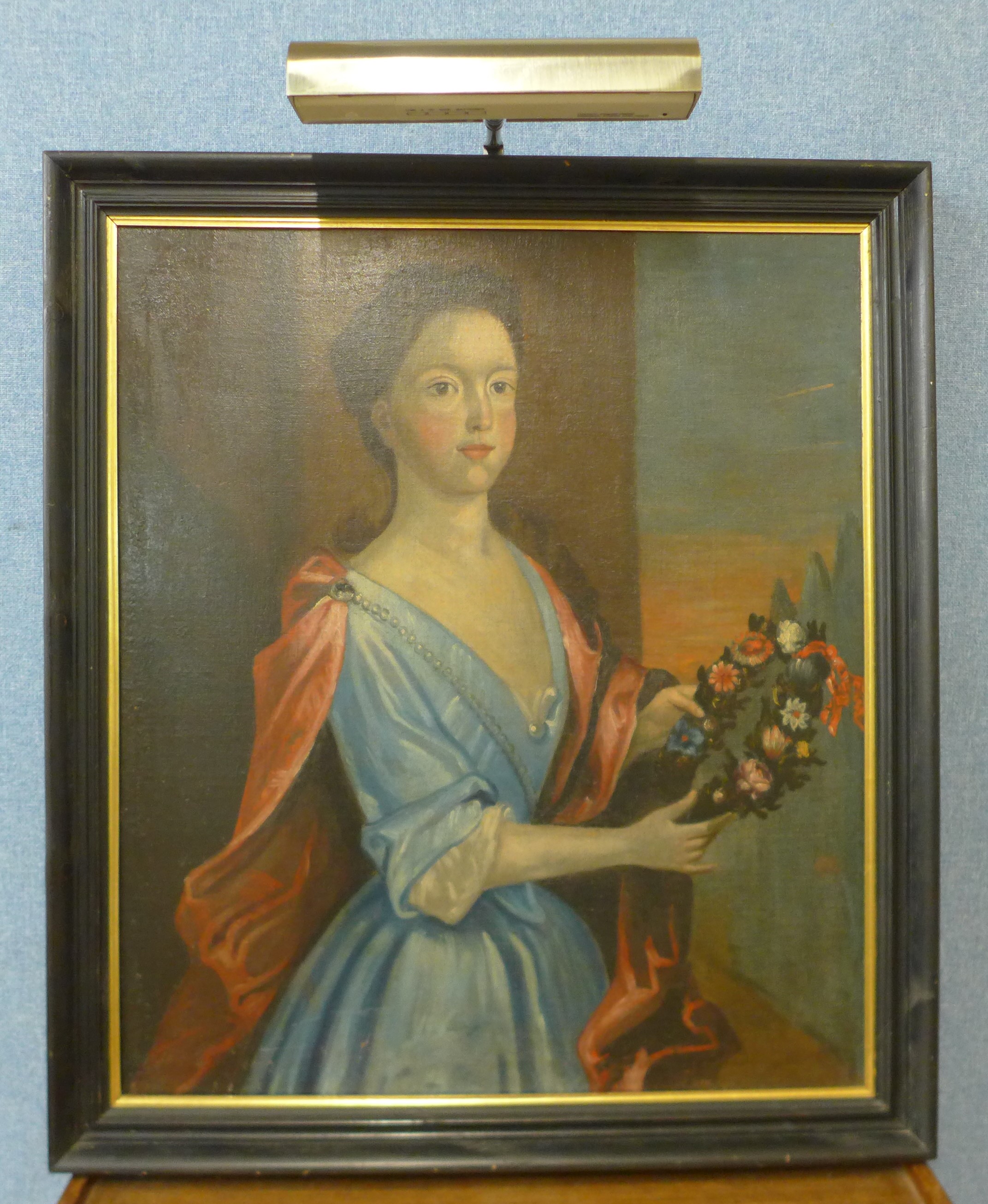 A portrait of an 18th-century lady holding flowers, oil on canvas, unsigned - Image 2 of 3