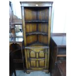 An oak corner cupboard