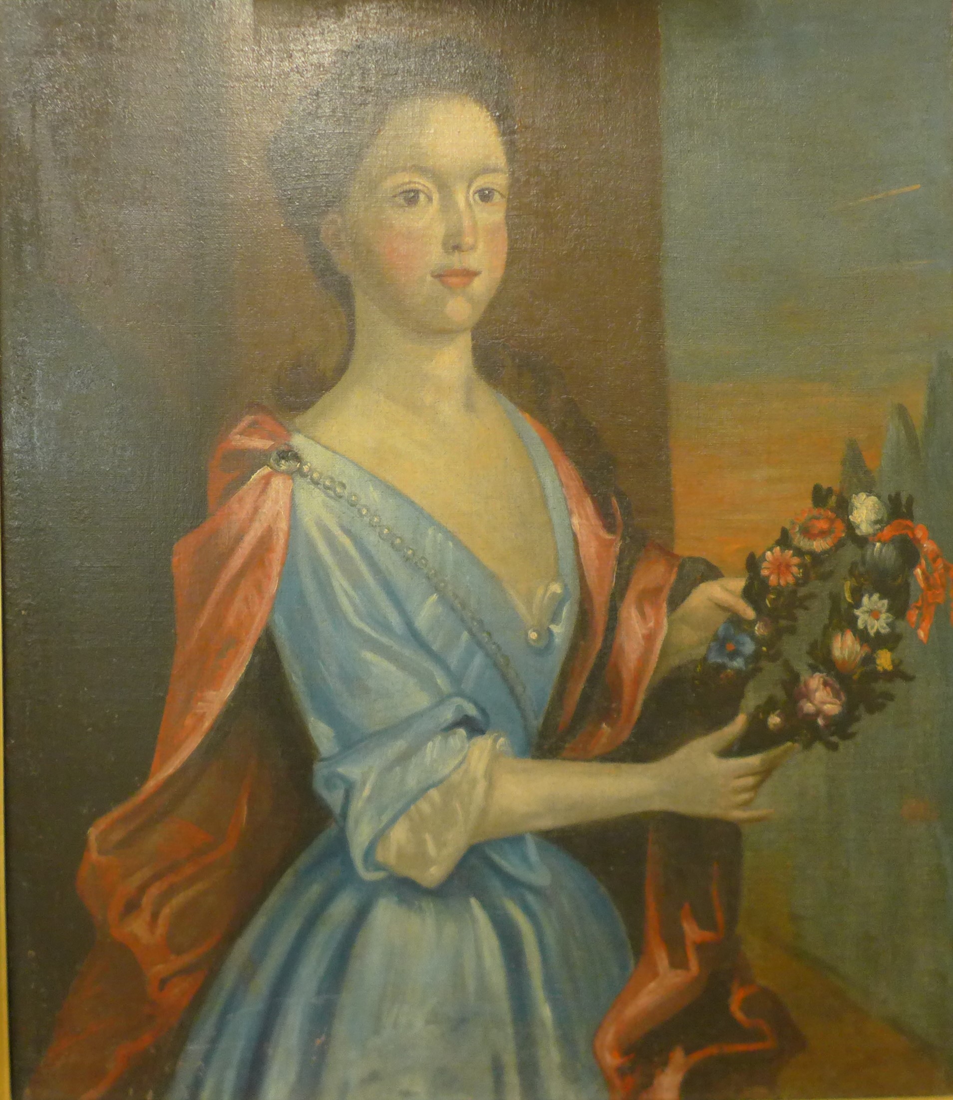 A portrait of an 18th-century lady holding flowers, oil on canvas, unsigned