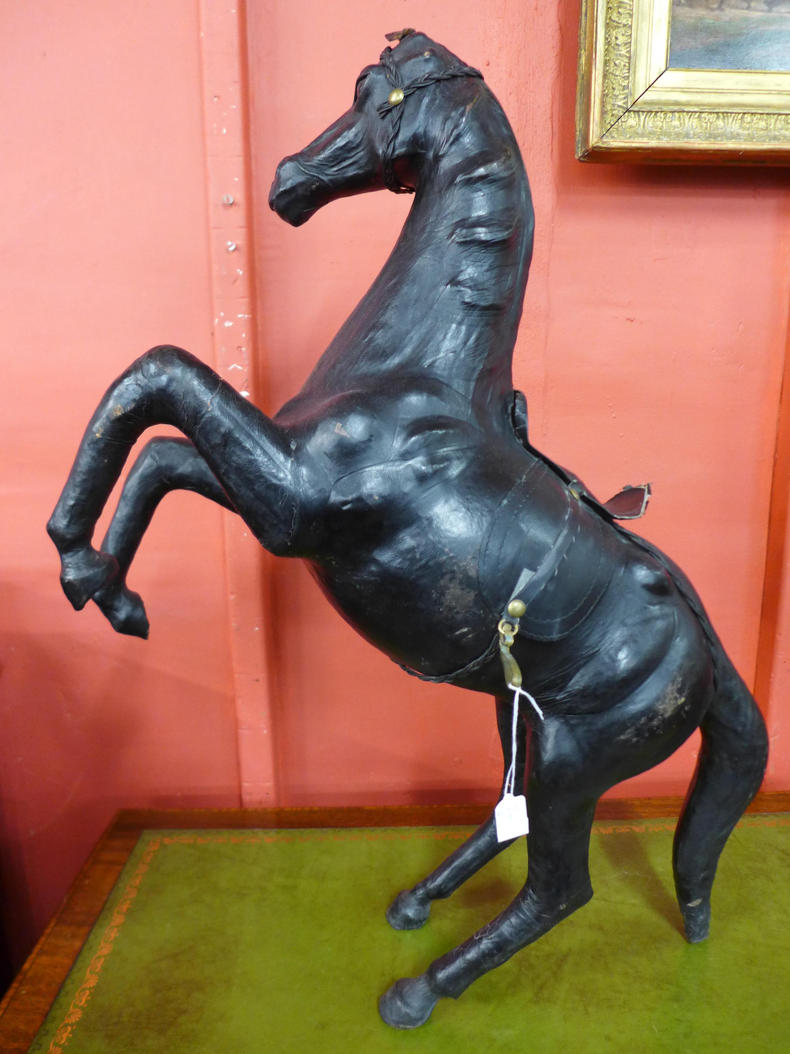 A figural leather horse