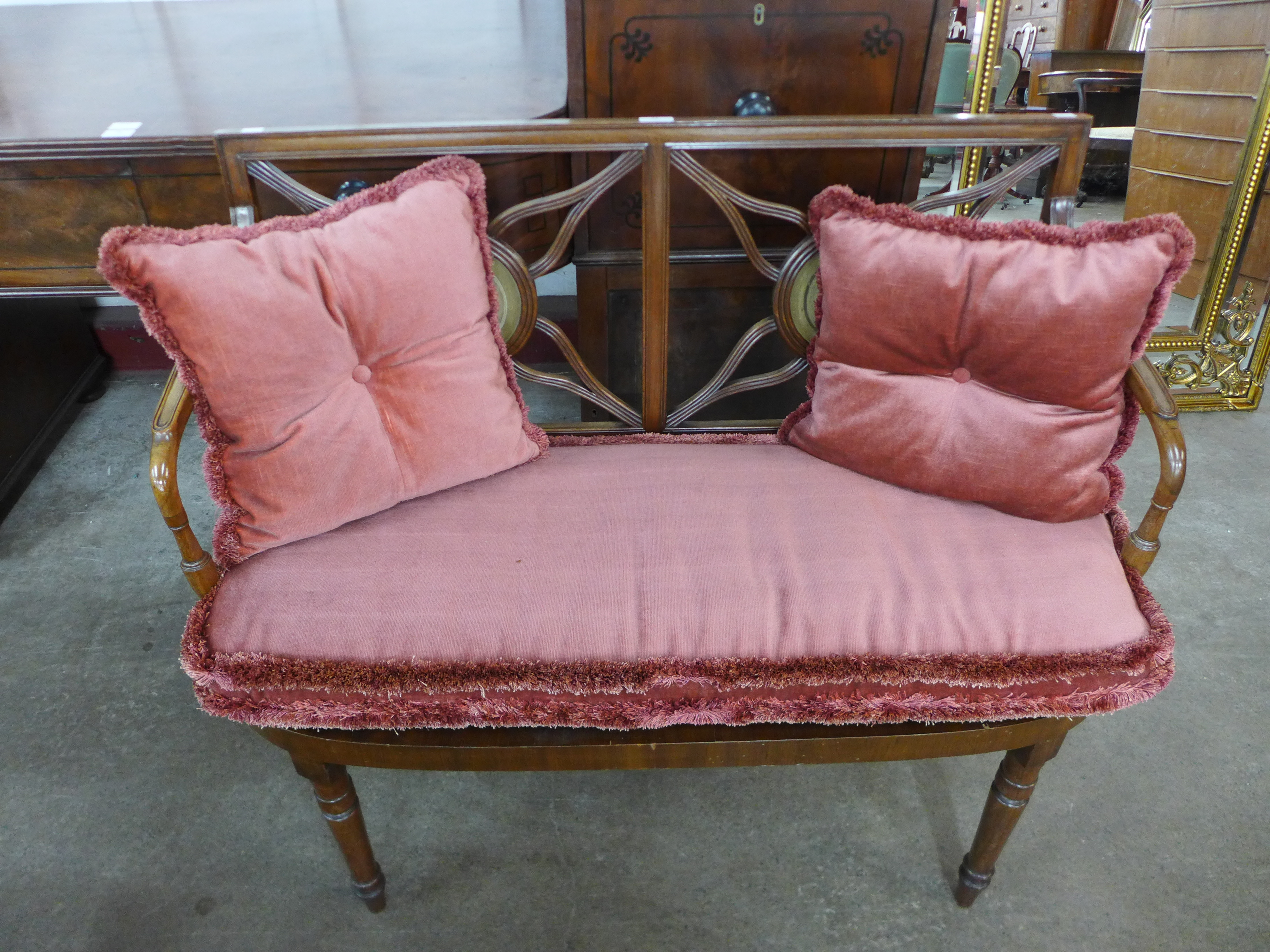 A George IV mahogany salon settee