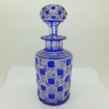 A blue cut glass decanter, 22cm