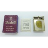 A nickel plated Dunhill lighter in original box with instruction leaflet
