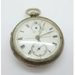 A silver cased pocket watch with chronograph dial
