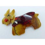 An Art Deco style lucite dog brooch