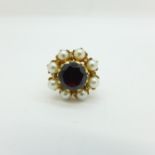 A 9ct gold, garnet and pearl cluster ring, 4.2g, M