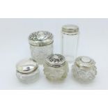 Five silver topped jars