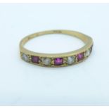 A 9ct gold red and white stone half eternity ring, 1.1g, L