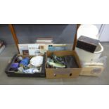 A case of LP records, a Bush VTR 103 radio, laundry basket, two wooden boxes, a box of china