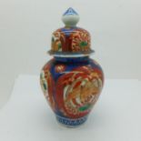 An Imari jar and cover, 18cm