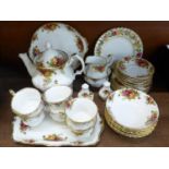 A Royal Albert Old Country Roses six setting tea set with teapot and six additional cereal bowls,