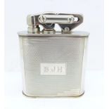 An Art Deco silver table lighter, with inscription, 97mm