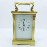 A brass and four glass sided carriage clock, stamped ACC, no key