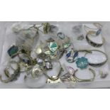 A collection of mainly mother of pearl set jewellery and an opal set boomerang brooch